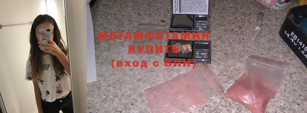 твердый Мегион